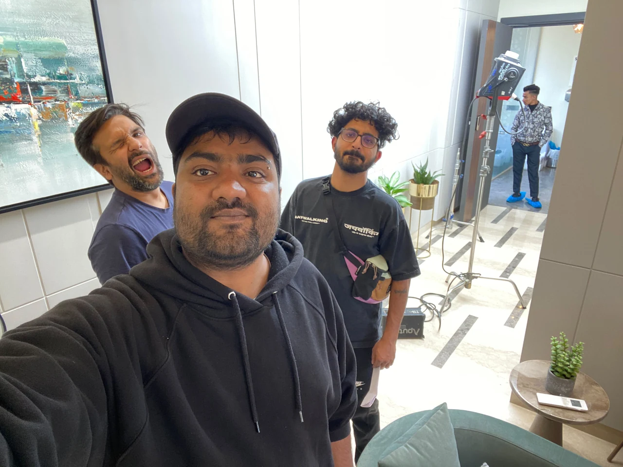 The KADIMA crew behind the scenes on a film set.